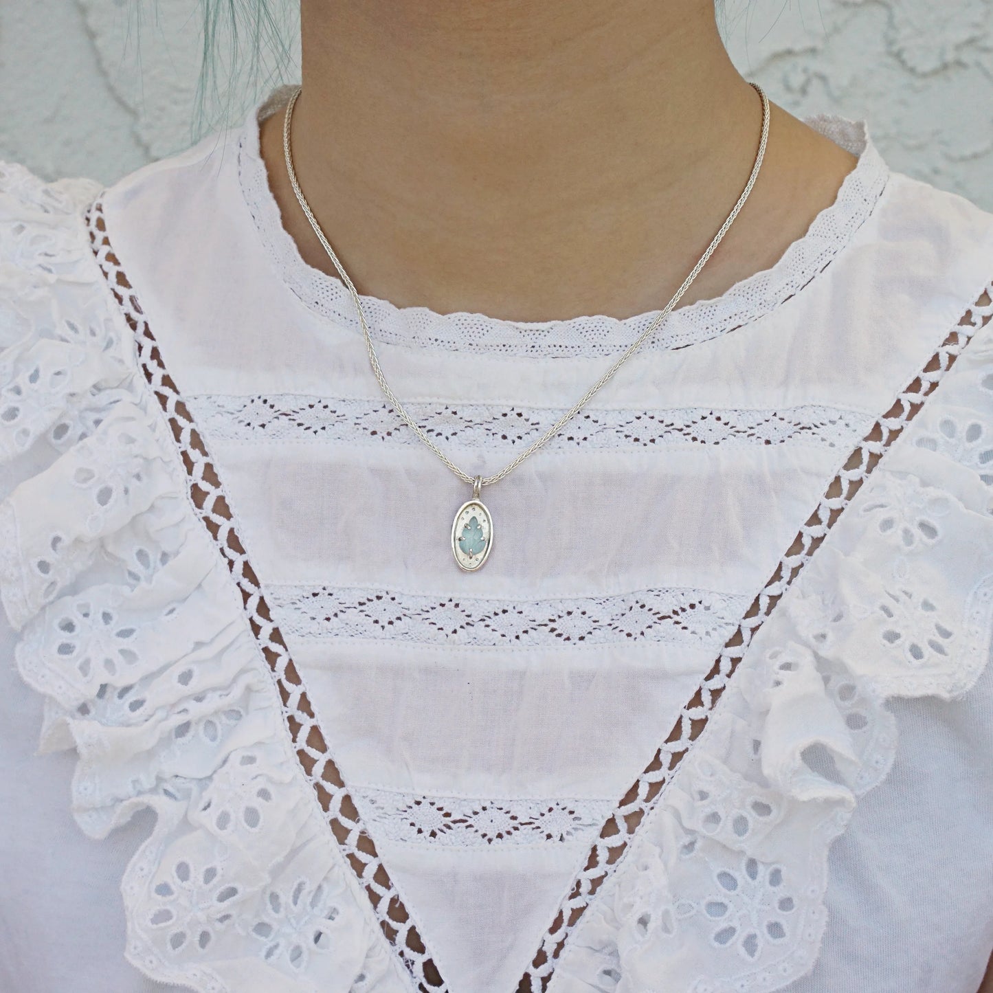 Pendant of Curiosities: leafy aquamarine