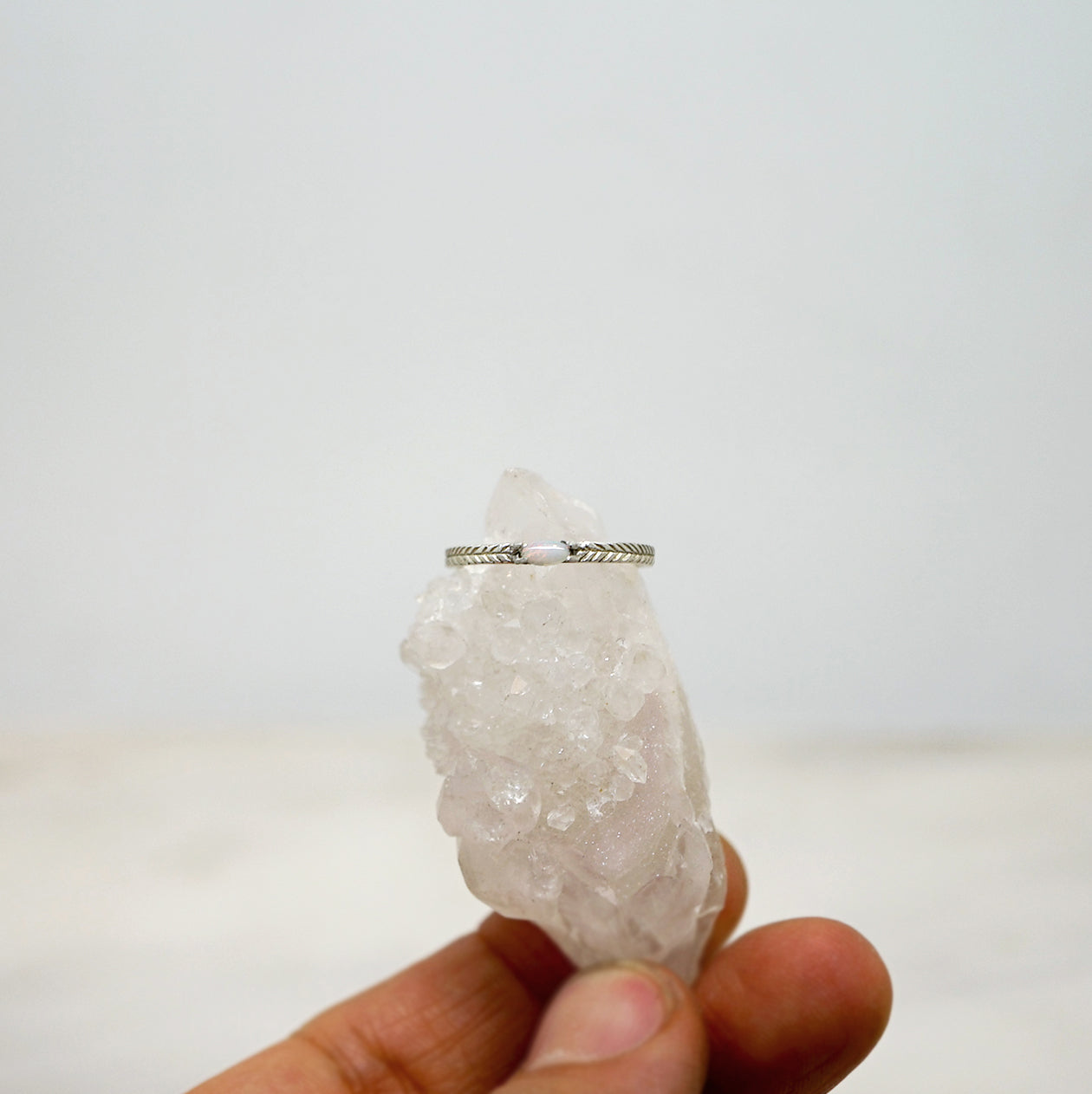 Opal solitaire ring with details