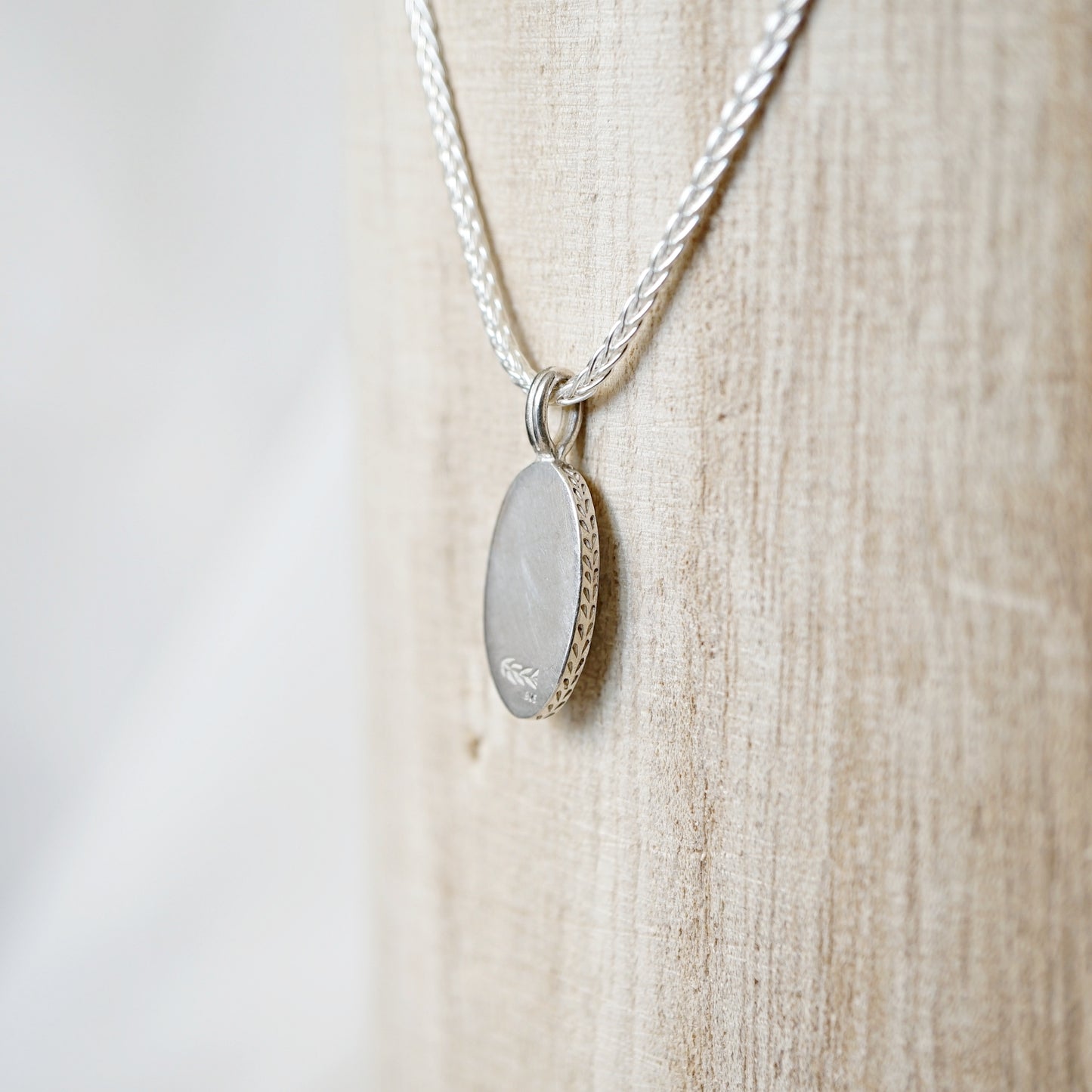 Pendant of Curiosities: leafy aquamarine
