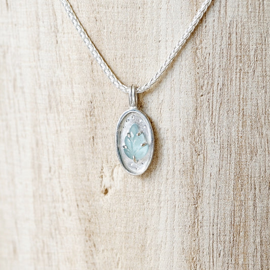 Pendant of Curiosities: leafy aquamarine