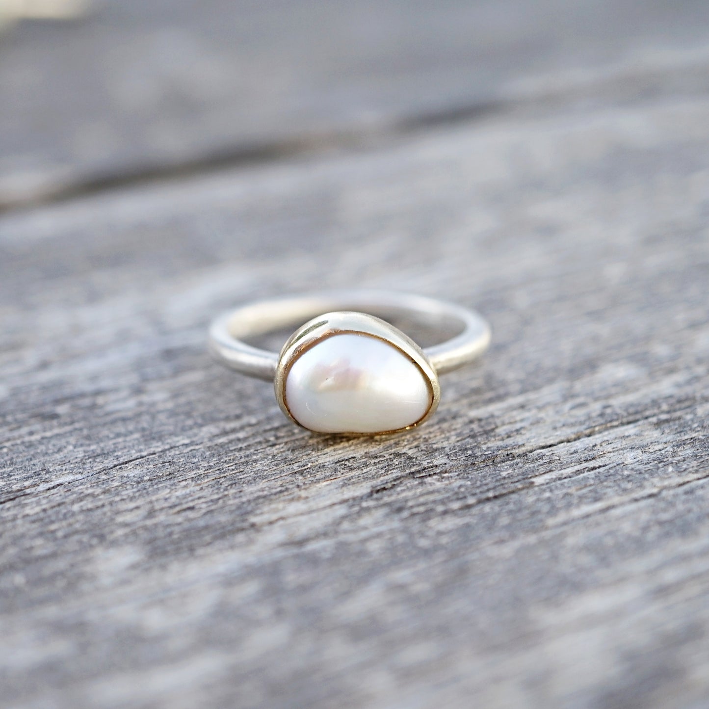 Pearl solitaire ring