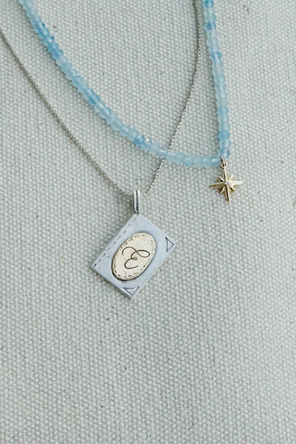 Initial book pendant necklace-14k gold & silver