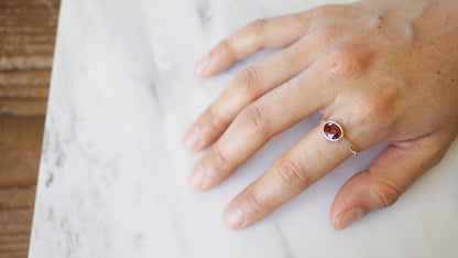 Garnet solitaire ring