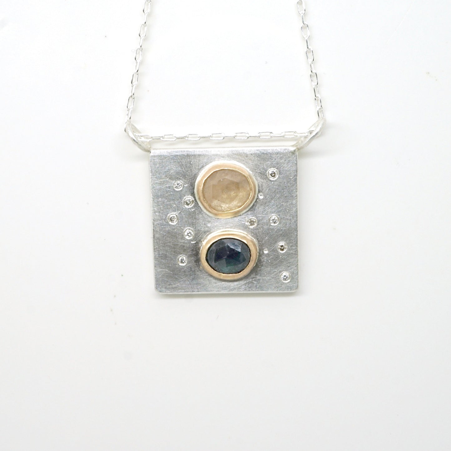 Art pendant necklace with sapphire and diamond