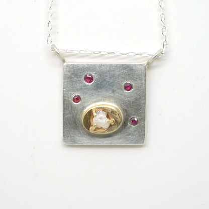 Art pendant necklace with ruby and raw diamond