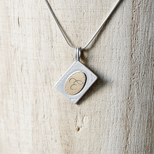 Initial book pendant necklace-14k gold & silver