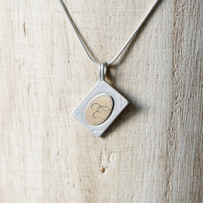 Initial book pendant necklace-14k gold & silver