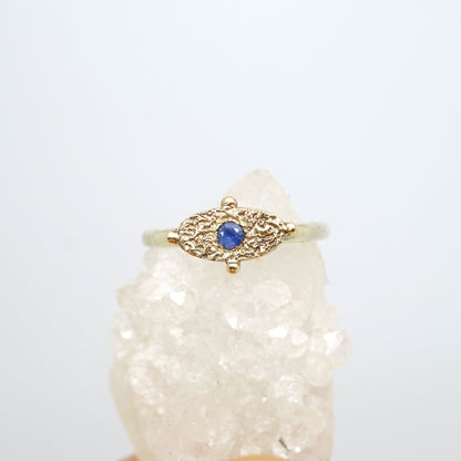 Textured signet ring with blue sapphire